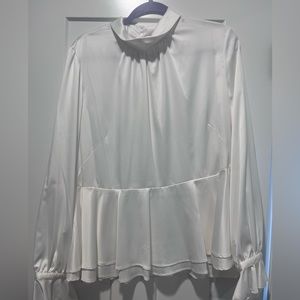 Beautiful silky peplum blouse.